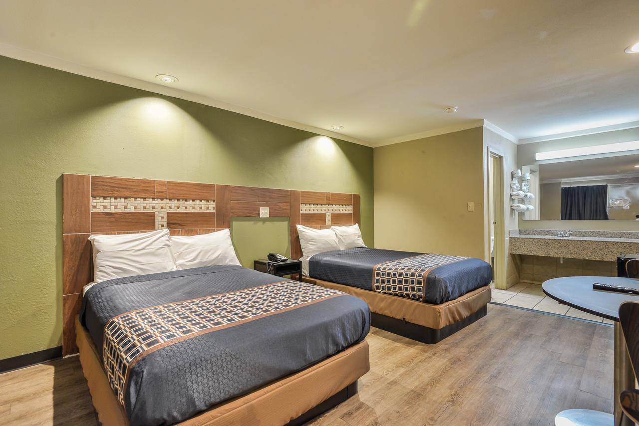 رالي Budgetel Inn And Suites المظهر الخارجي الصورة
